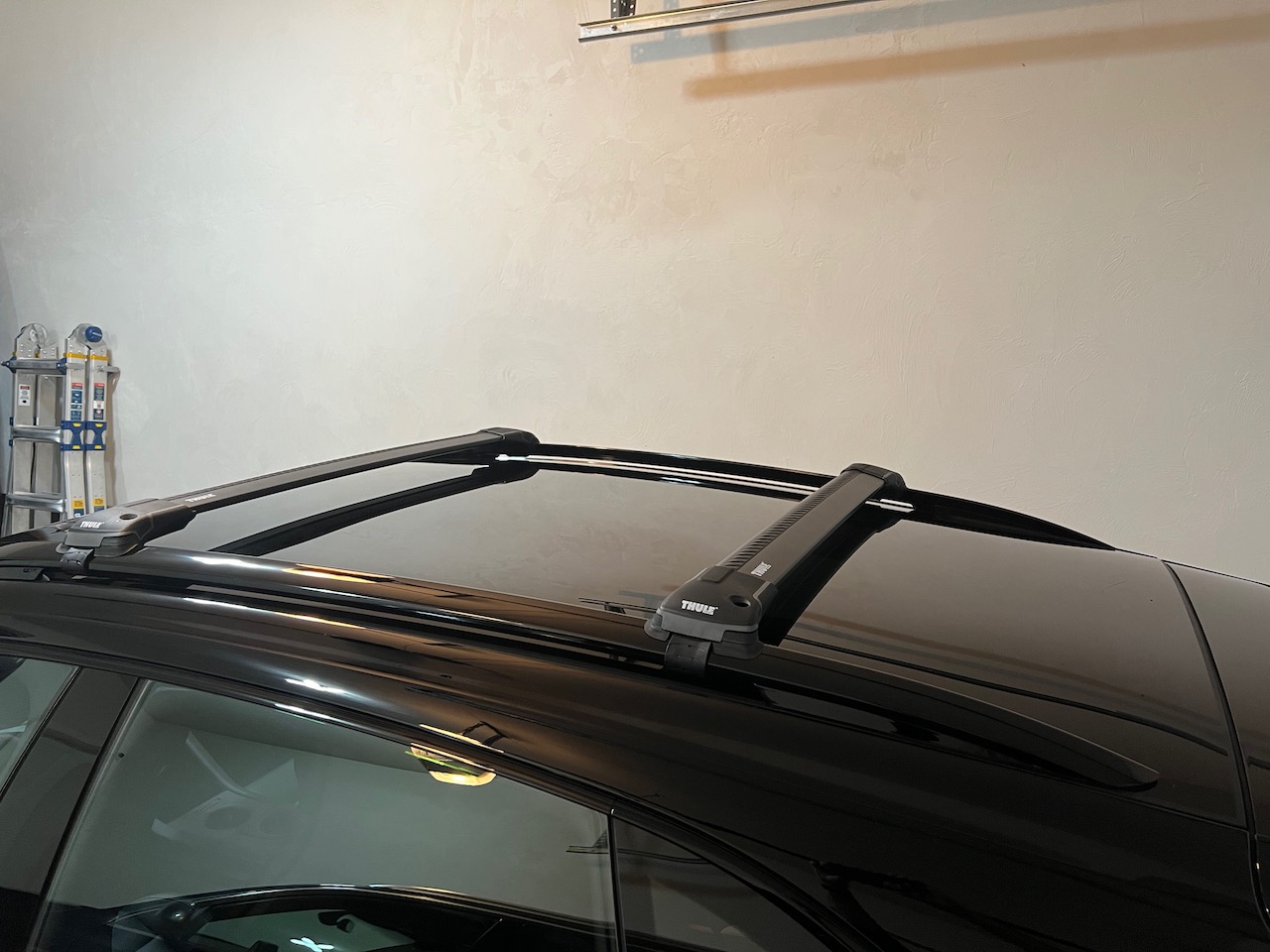 Porsche Taycan Performance Roof Box + Thule WingBars = Noise Issues MountedTWB - 1