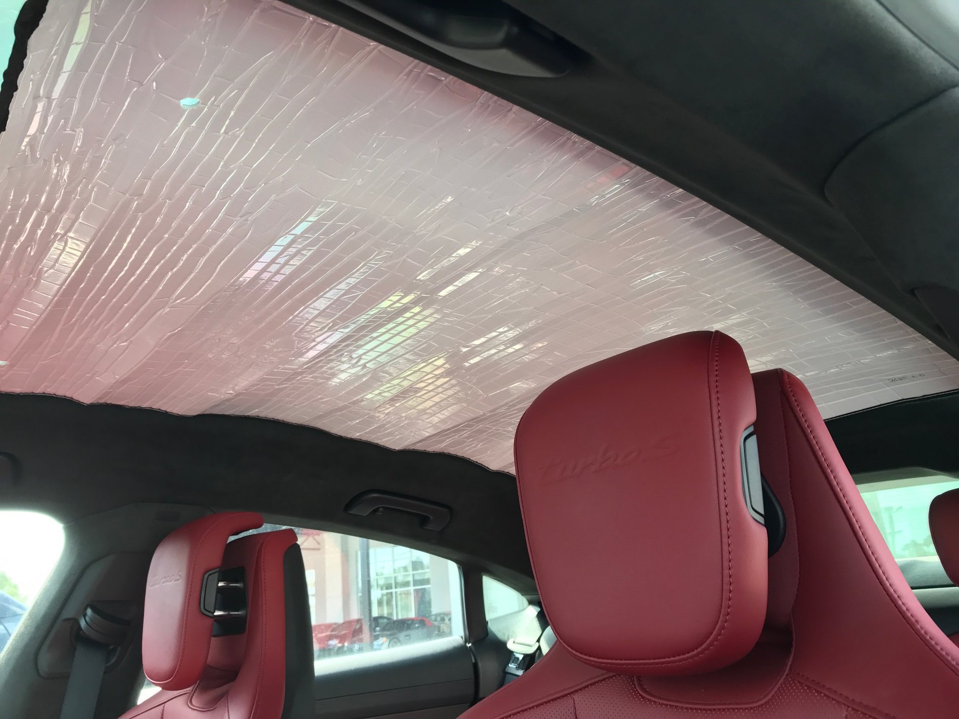 Porsche Taycan Concerns about panoramic roof and sun Sunshield Panoramic roof sunshade in place.JPG